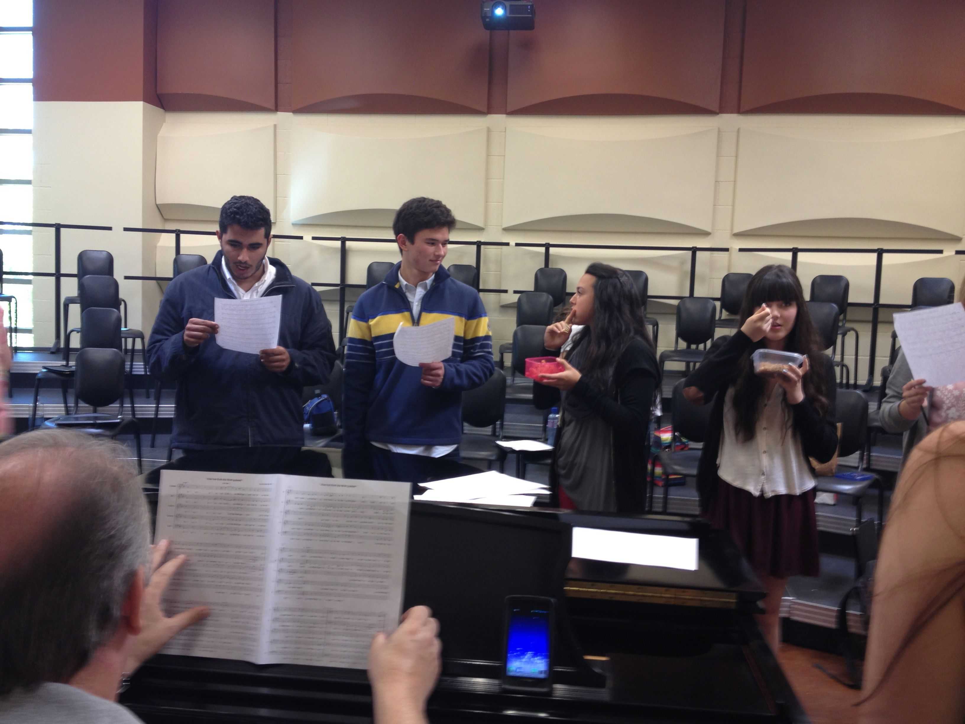 Sage Hill Singers senior Keivon Akbari, senior Brett Dunlavey, junior Natalie Lowenstein and senior Sydney Endicott rehearse during lunch. September 30 2013. Photographer: Maddi Bukaty
