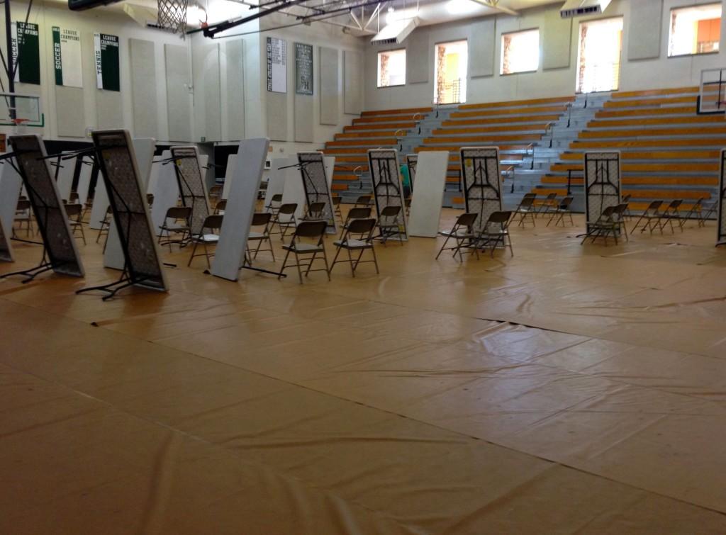 Tables and chairs being put away after the Sept. 18 Plan test for all sophomores in the Peter V. Ueberroth Gymnasium. September 18 2013.