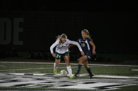 Sophomore Lauren Thunen challenges a La Canada player. March 3 2014. Photographer: Rebecca Lynskey.