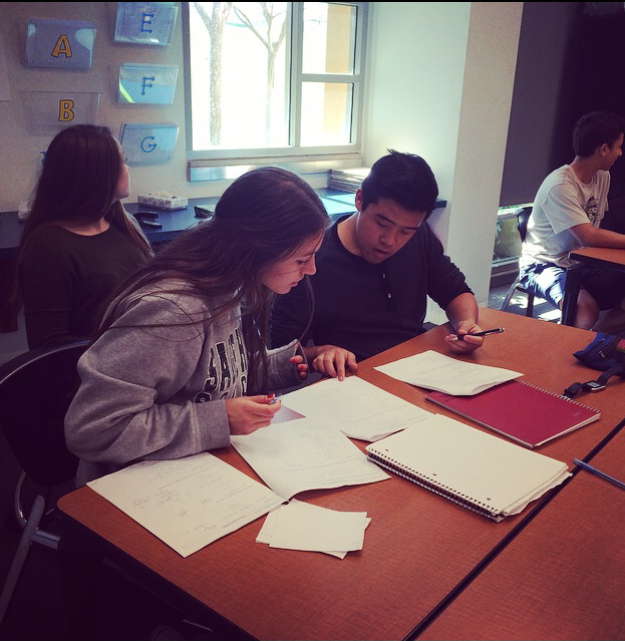 Students in Kelly Mays Accelerated Precalculus class collaborate on an assignment.