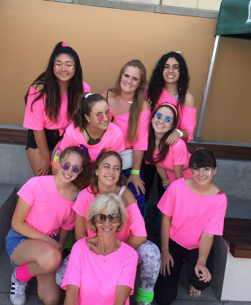 Madame Rouville's advisory dresses up for the retro themed senior pool party retreat