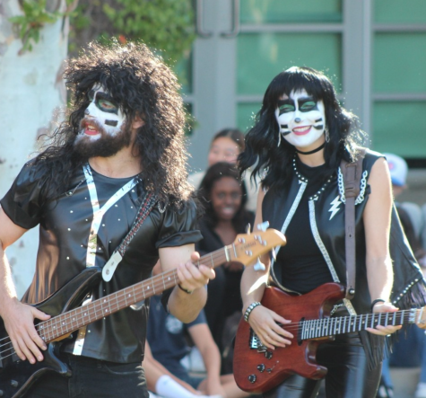 Mr. Derek Shapiro and Mrs. Megan Rutherford perform as rock band KISS at the Halloween Costume Contest.