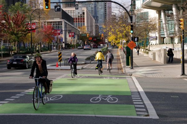 A separated bicycle lane in downtown Vancouver, Canada. (Courtesy of Creative Commons)