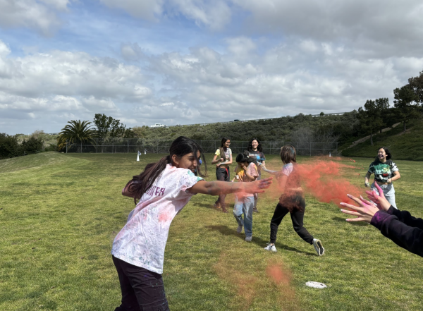 Sage Hill students throw colored chalk during the Holi celebrating hosted by South Asian affinity Group on March 13. 
