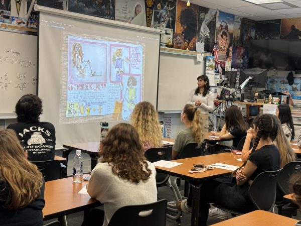 Students attend the seminar, Feminism in Art: Objectification of Women Throughout Art History presented by Junior Aava Ghorbanian.