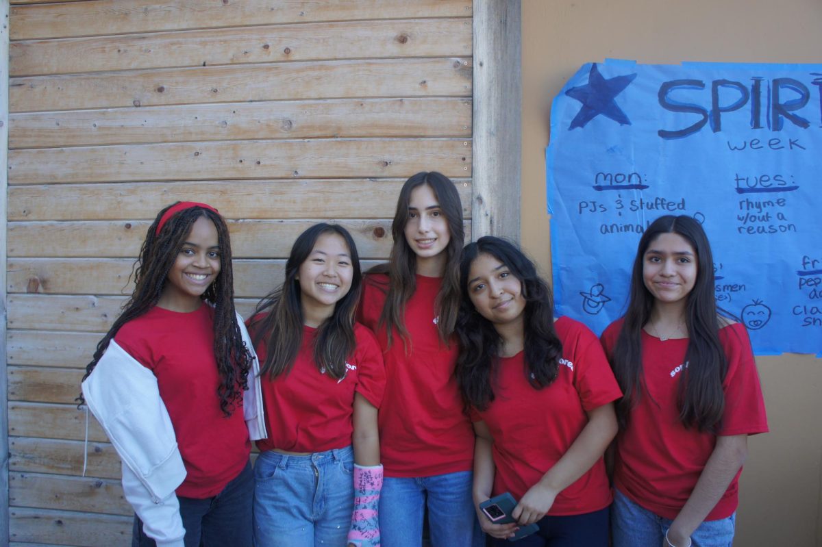 Sophomores Sienna Burnette, Cheryl Xin, Freja Westrell, Breeze Estrada, and Valeria Uribe getting ready for the Pep Rally on Oct. 25.