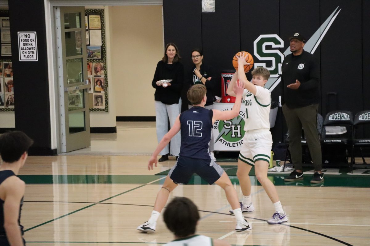 Junior Carson Ellis (10) makes a pass to his teammates on January 10, 2025.