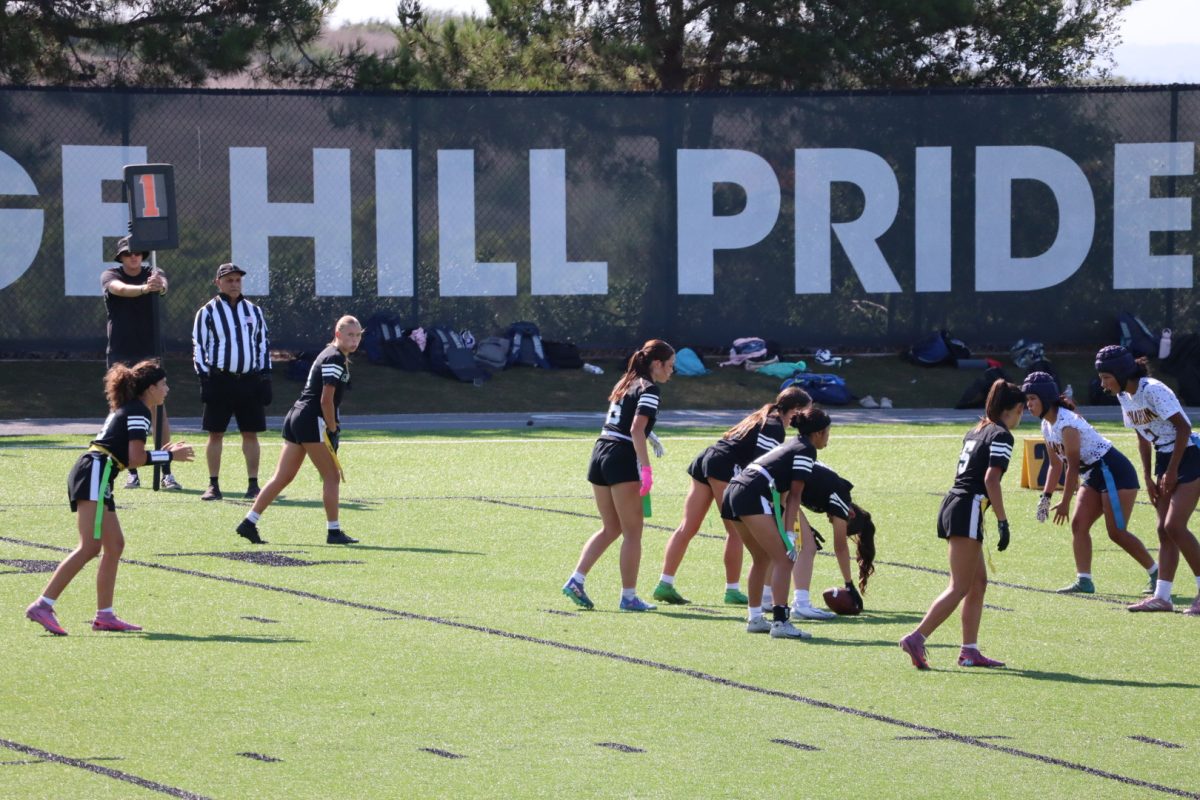 The quarterback, Freshman Roya Mazi (3), decides on who she should pass the ball to on Aug. 22.