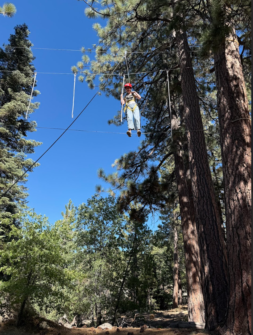Senior Mia Li participates in the high ropes activity on Sept. 9.