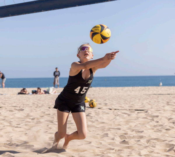 Freshman Amelia Crimbchin in action on the sand.
